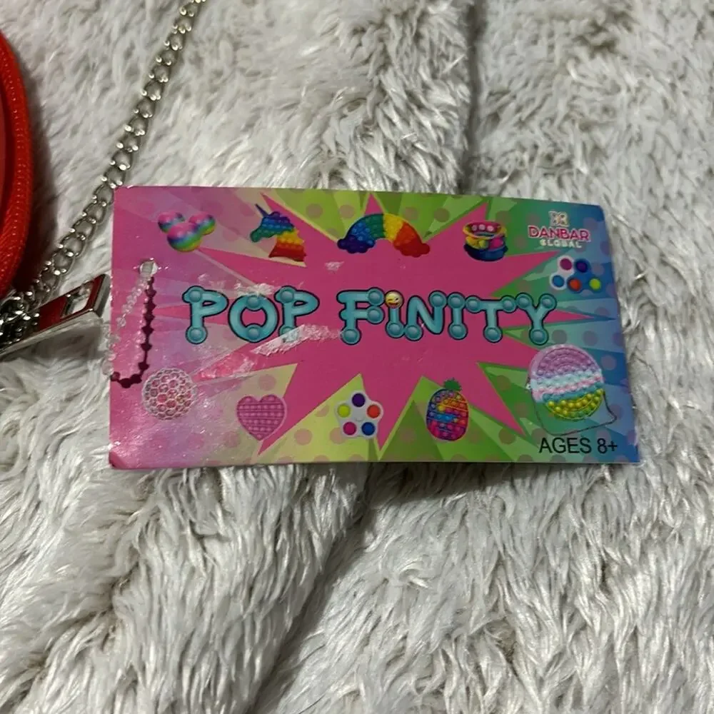 Pop Finity round crossbody purse silver chain nwt perfect fidget rainbow tie dye